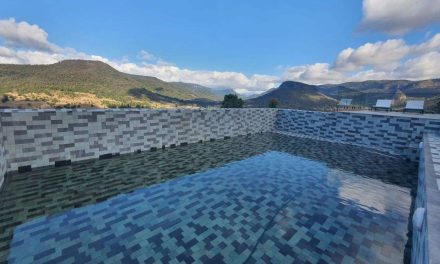 The Elegance of Green Sukabumi Stone & Black Lavastone Swimming Pool